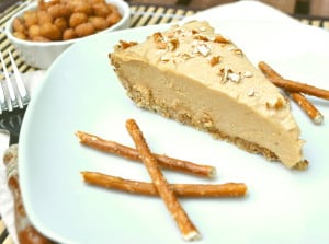 Sweet and salty peanut butter cheesecake pie in a pretzel crust | Rich & creamy with a crunch | So easy - pie filling is no bake | craftycookingmama.com