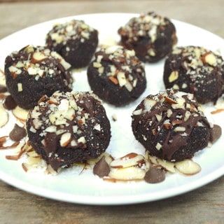 Delicious, healthy, fiber rich chocolate coconut almond bites inspired by Almond Joys. Made with coconut flour - vegan, gluten free, paleo friendly | craftycookingmama.com