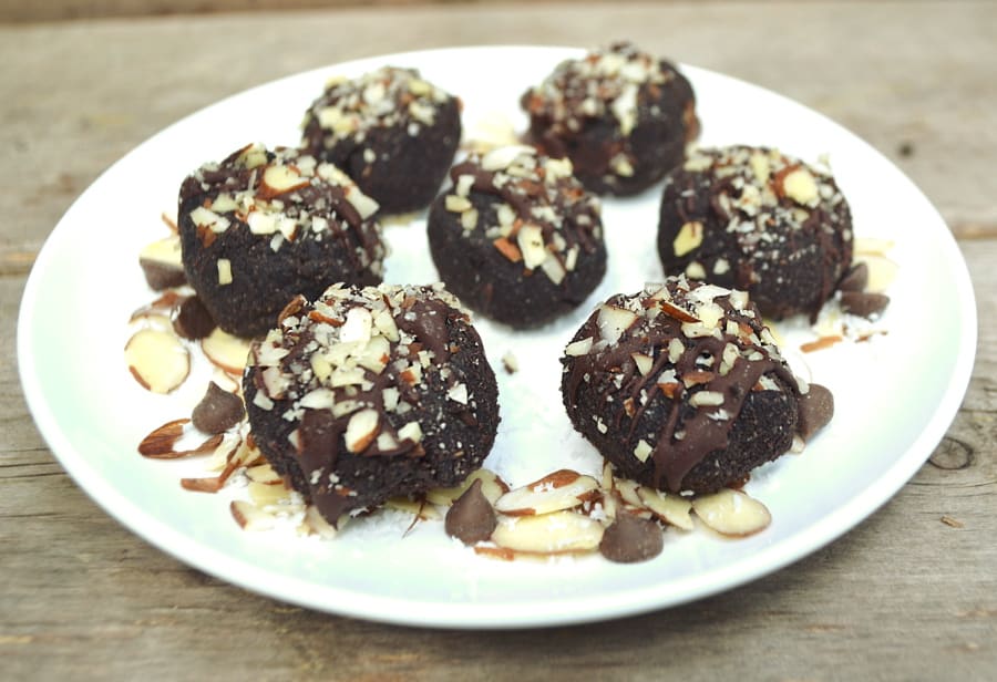 Delicious, healthy, fiber rich chocolate coconut almond bites inspired by Almond Joys. Made with coconut flour - vegan, gluten free, paleo friendly | craftycookingmama.com