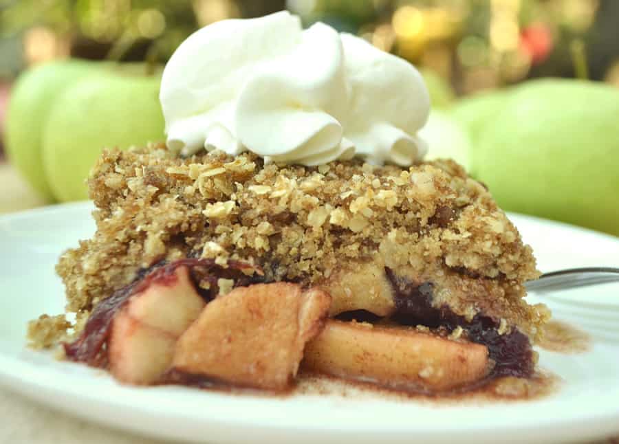 Welcome fall with Apple Cranberry Crisp Crumble | Cinnamon baked apples, a sweet, tart layer of cranberry sauce & a candied, crumbly, buttery oat topping | craftycookingmama.com