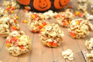Bringing back an old favorite - Popcorn Balls | Made with Marshmallow, Candy Corn, Pretzels & Peanuts | Kids & Adults Love this Halloween Treat | craftycookingmama.com