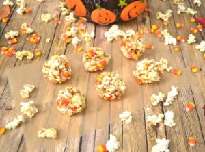 Bringing back an old favorite - Popcorn Balls | Made with Marshmallow, Candy Corn, Pretzels & Peanuts | Kids & Adults Love this Halloween Treat | craftycookingmama.com