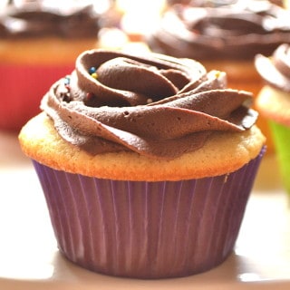 One Dozen Yellow Cupcakes with Chocolate Buttercream Frosting | Simple & Delicious | www.craftycookingmama.com