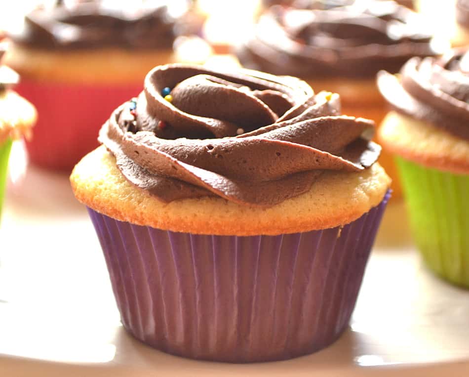 One Dozen Yellow Cupcakes with Chocolate Buttercream Frosting | Simple & Delicious | www.craftycookingmama.com