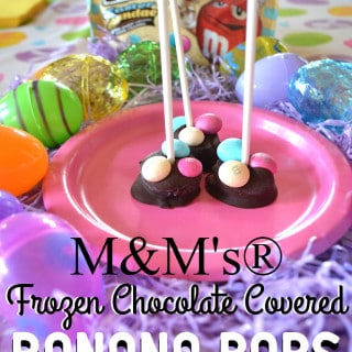 Chocolate Covered Frozen Banana Pops | Chunks of banana dipped in dark chocolate & topped with M&M's® | An easy & perfect anytime sweet snack | www.craftycookingmama.com