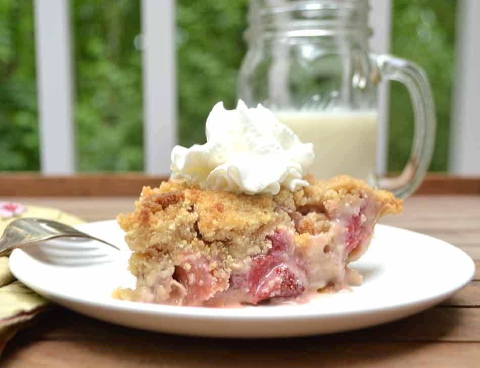 A sweet and simple French Strawberry Rhubarb Pie with a buttery brown sugar crumb topping | www.craftycookingmama.com