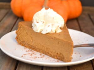 Molasses Pumpkin Cheesecake made with cream cheese & cottage cheese - a decadent, light & fluffy year round treat | www.craftycookingmama.com