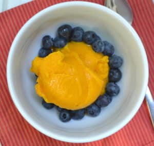 Mango Sorbet - a sweet, simple and decadent frozen treat made with just two ingredients. Healthy & vegan | www.craftycookingmama.com