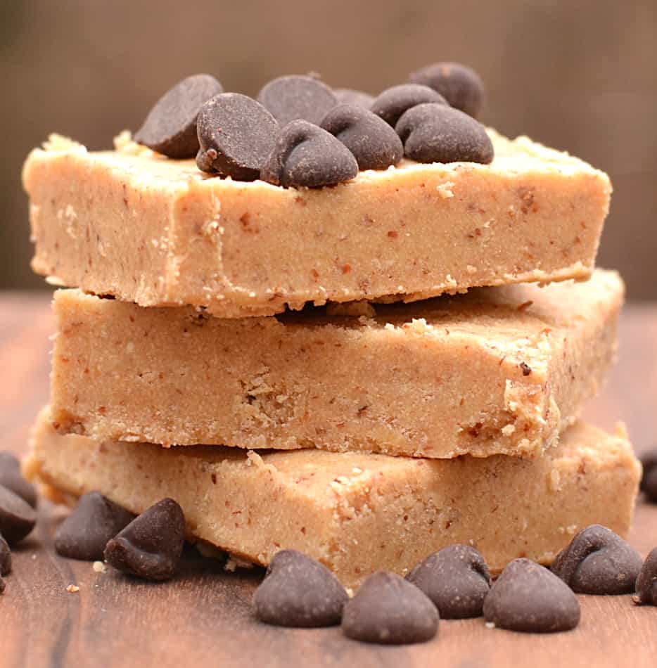These Low Carb Peanut Butter Cream Cheese Protein Bars taste like a healthy Peanut Butter Cheesecake!  Quick & simple to make - one bowl, no baking & no food processor | www.craftycookingmama.com