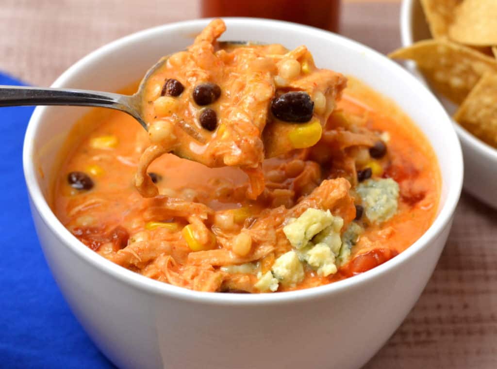 Bowl of Spicy Chicken Chili on spoon