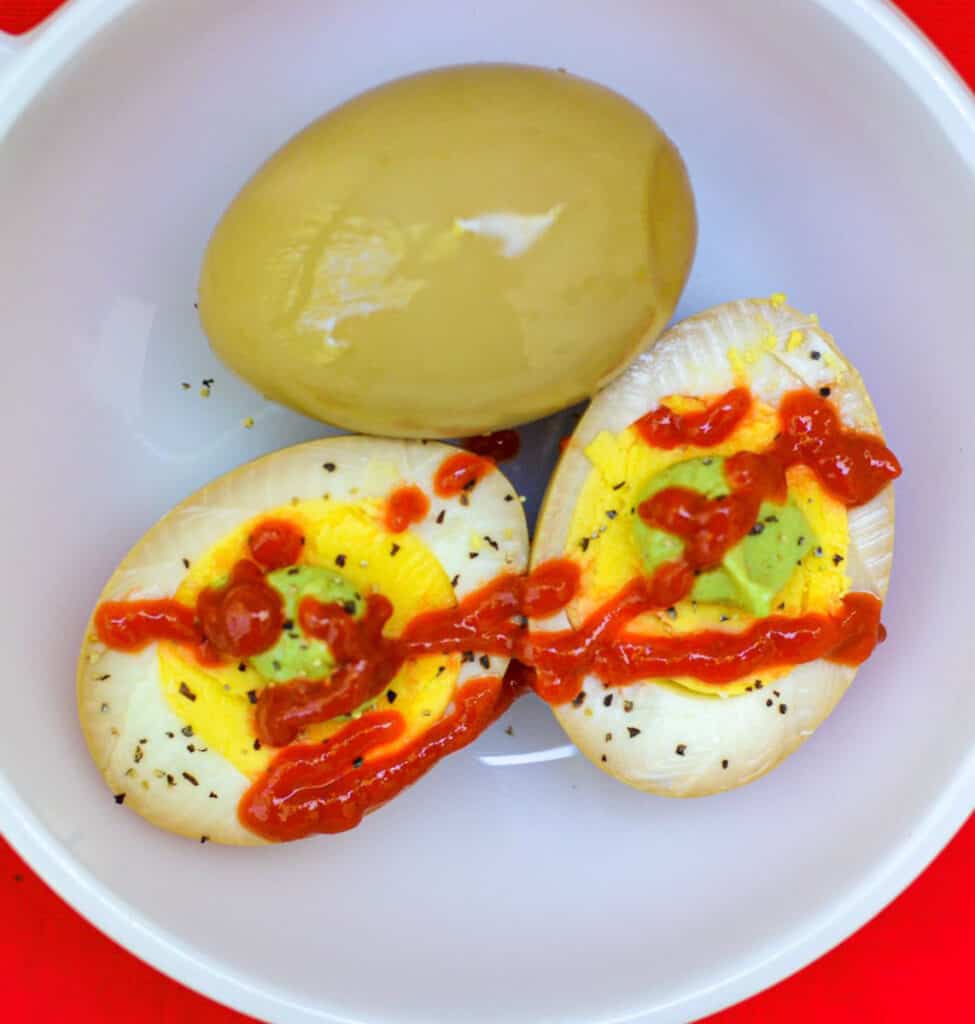 Soy Sauce Boiled Eggs Topped With Wasabi Mustard & Sriracha Sauce